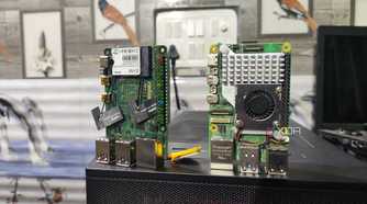 A Radxa X4 next to a Raspberry Pi 5