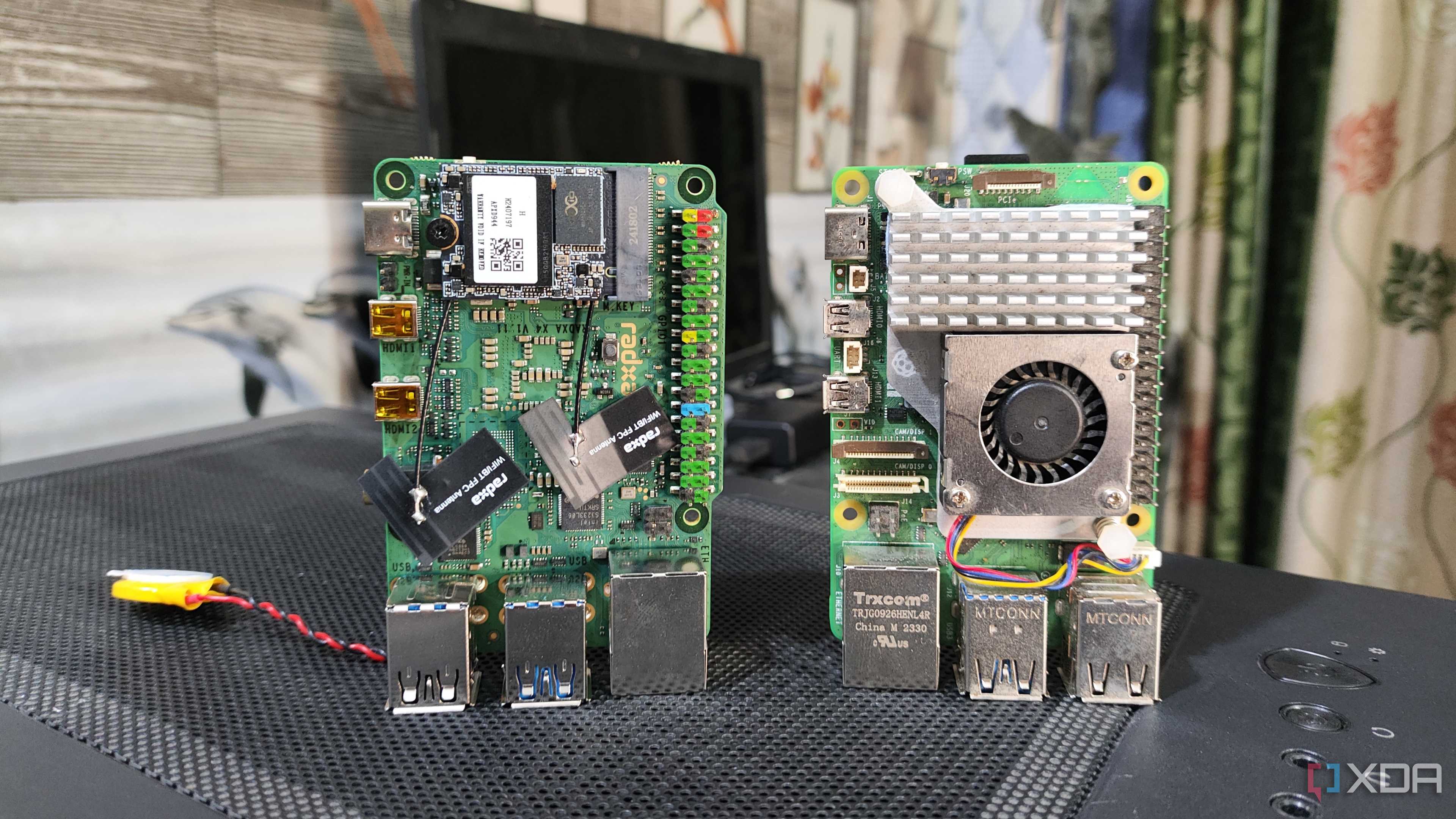 A Radxa X4 placed next to a Raspberry Pi 5