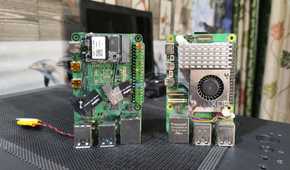 A Radxa X4 placed next to a Raspberry Pi 5
