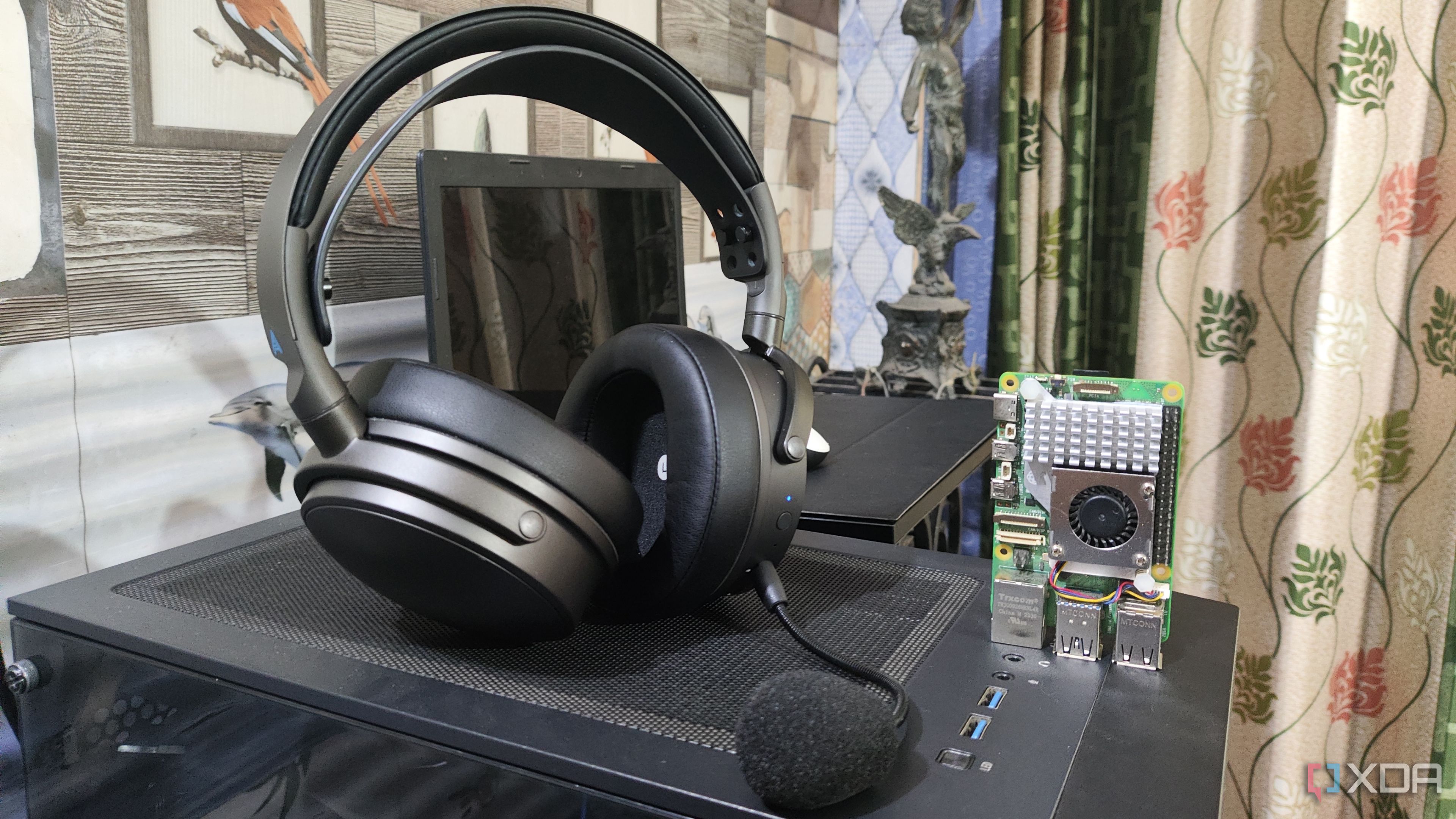 An Audeze Maxwell headset kept near the Raspberry Pi 5