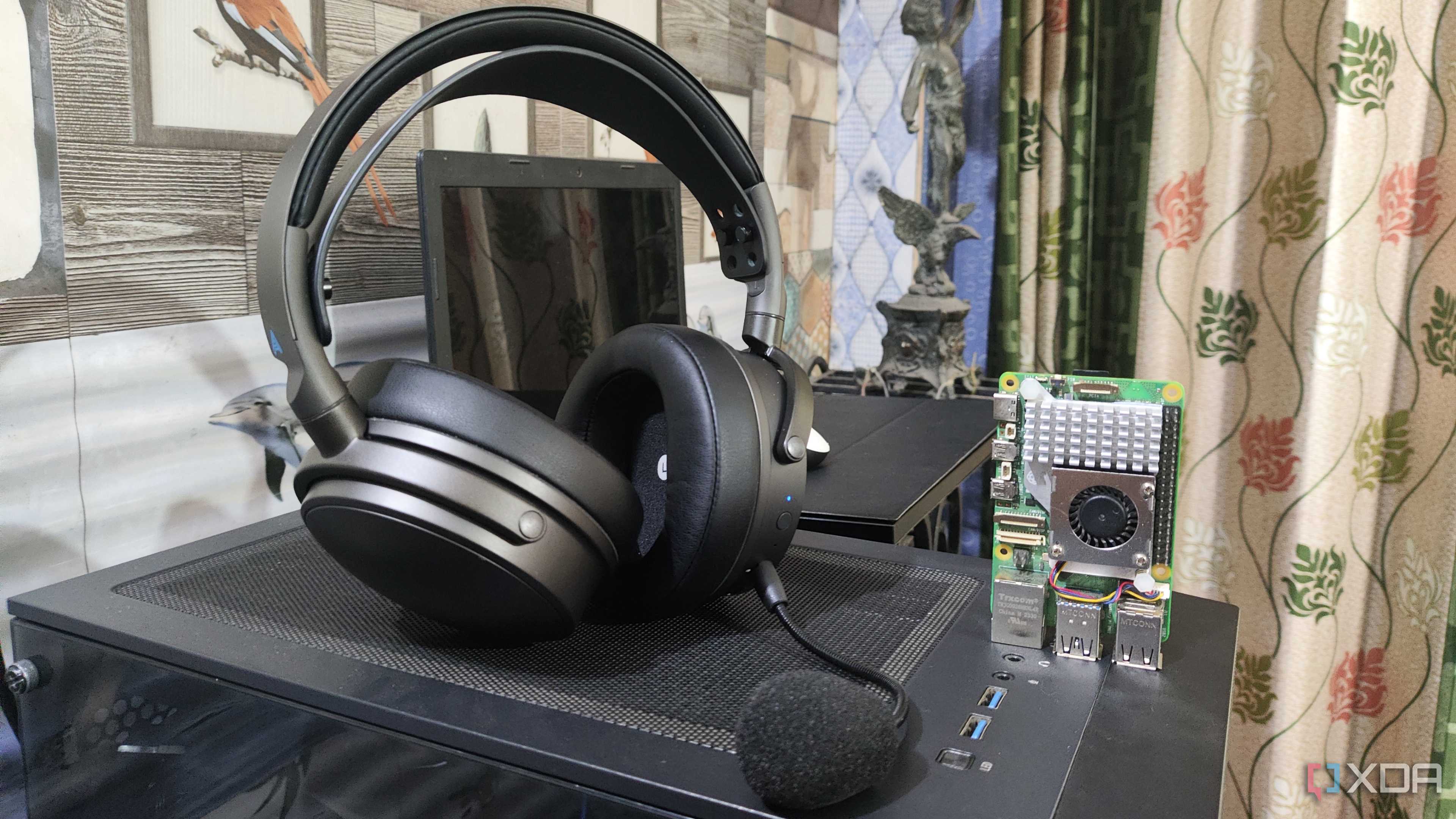 An Audeze Maxwell headset kept near the Raspberry Pi 5