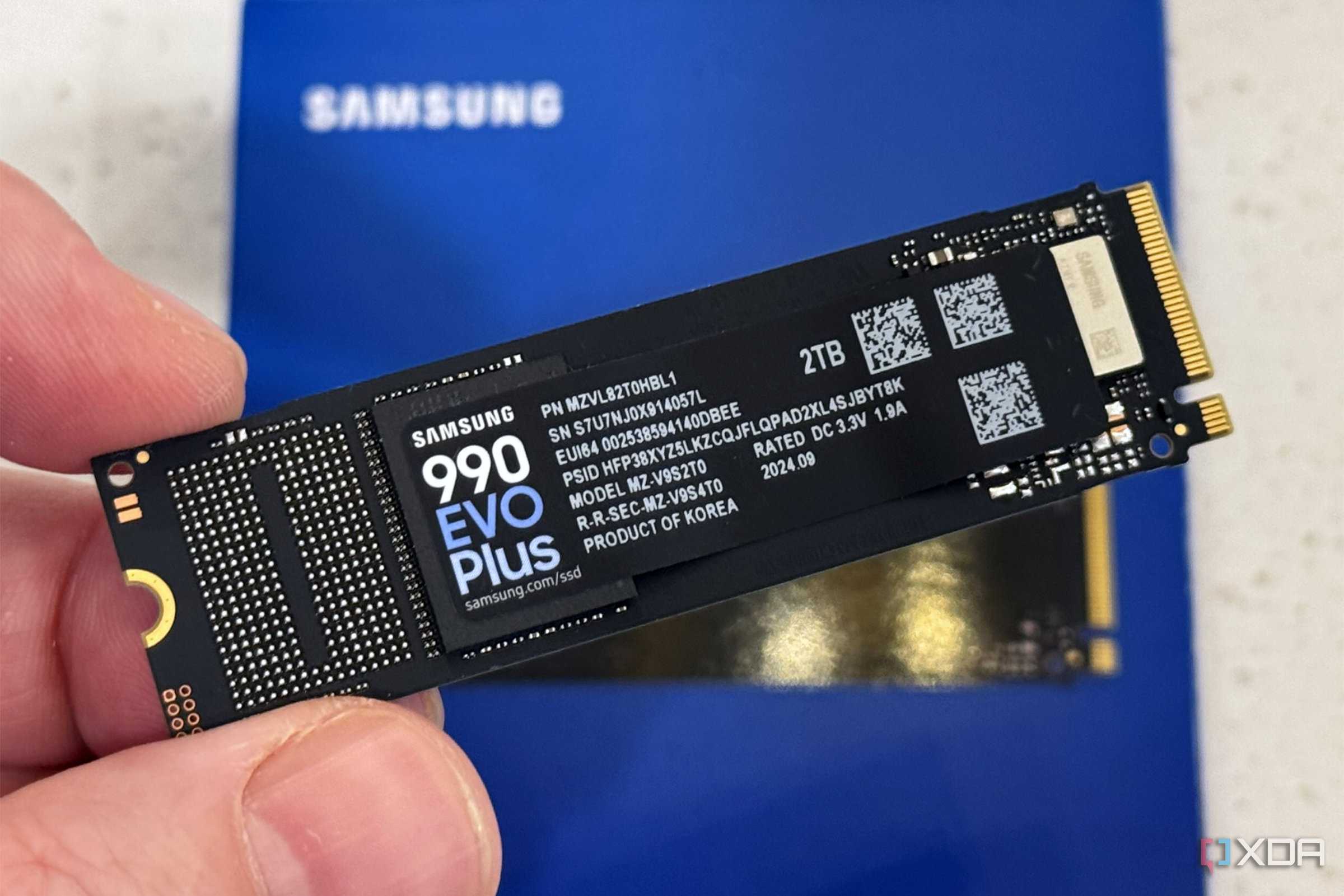 An image of the Samsung 990 evo plus ssd held in hand.