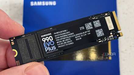 samsung 990 evo plus ssd held in hand front view