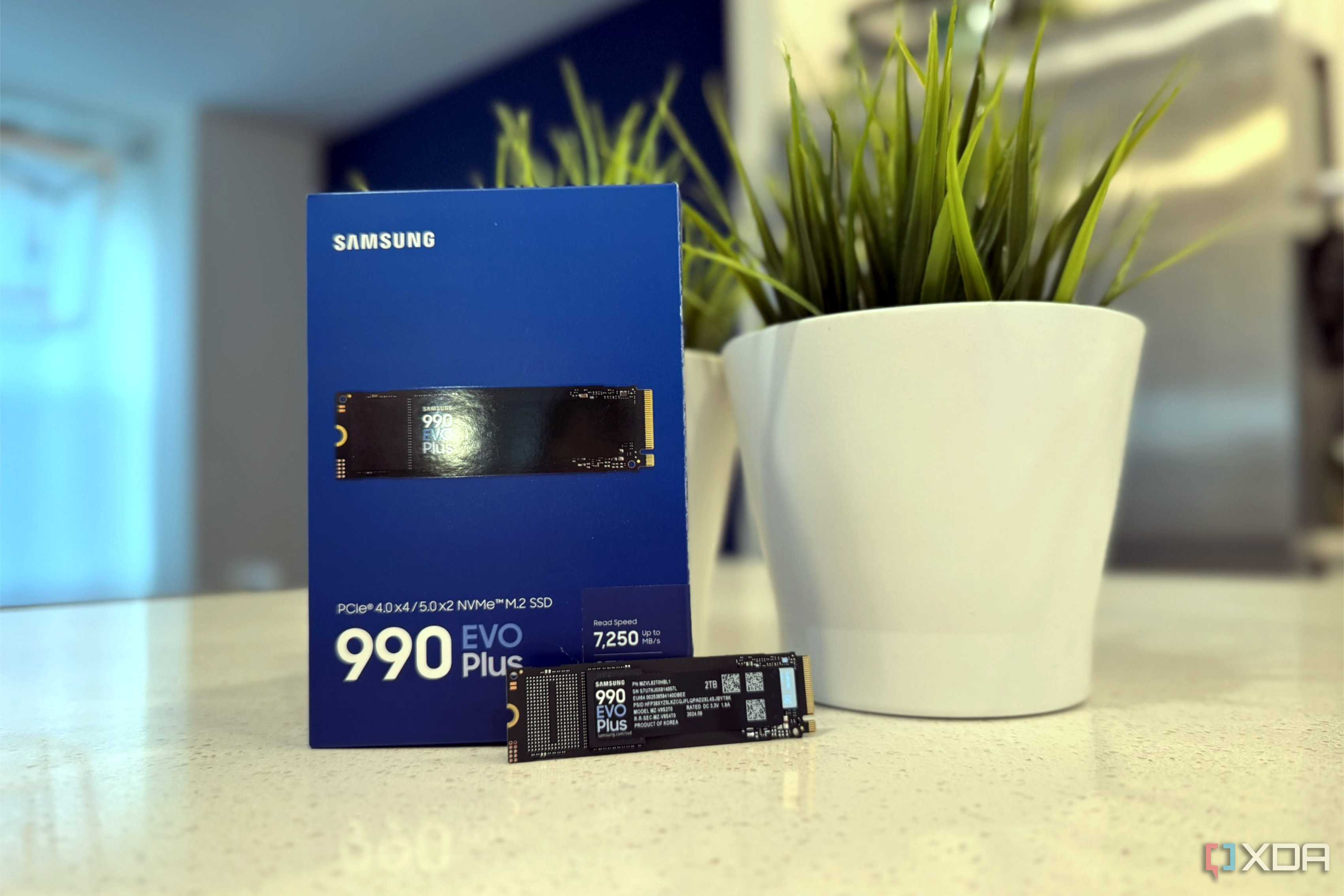 Samsung 990 EVO Plus SSD and box on a countertop