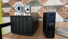 A Raspberry Pi 5 and Libre Computer Alta placed on top of a TerraMaster F4 424 Pro NAS