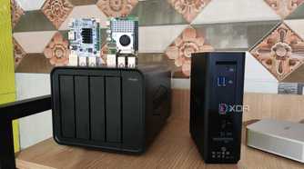 A Raspberry Pi 5 and Libre Computer Alta placed on top of a TerraMaster F4 424 Pro NAS