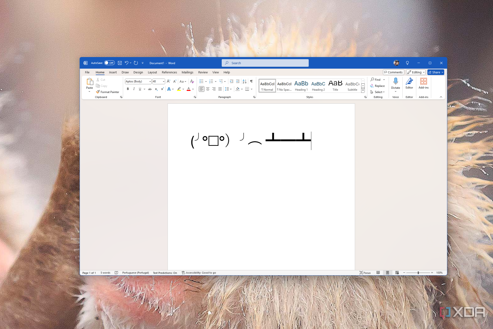 Screenshot of Microsoft Word with a kaomoji representing thew act of flipping a table over