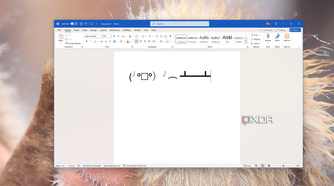Screenshot of Microsoft Word with a kaomoji representing thew act of flipping a table over