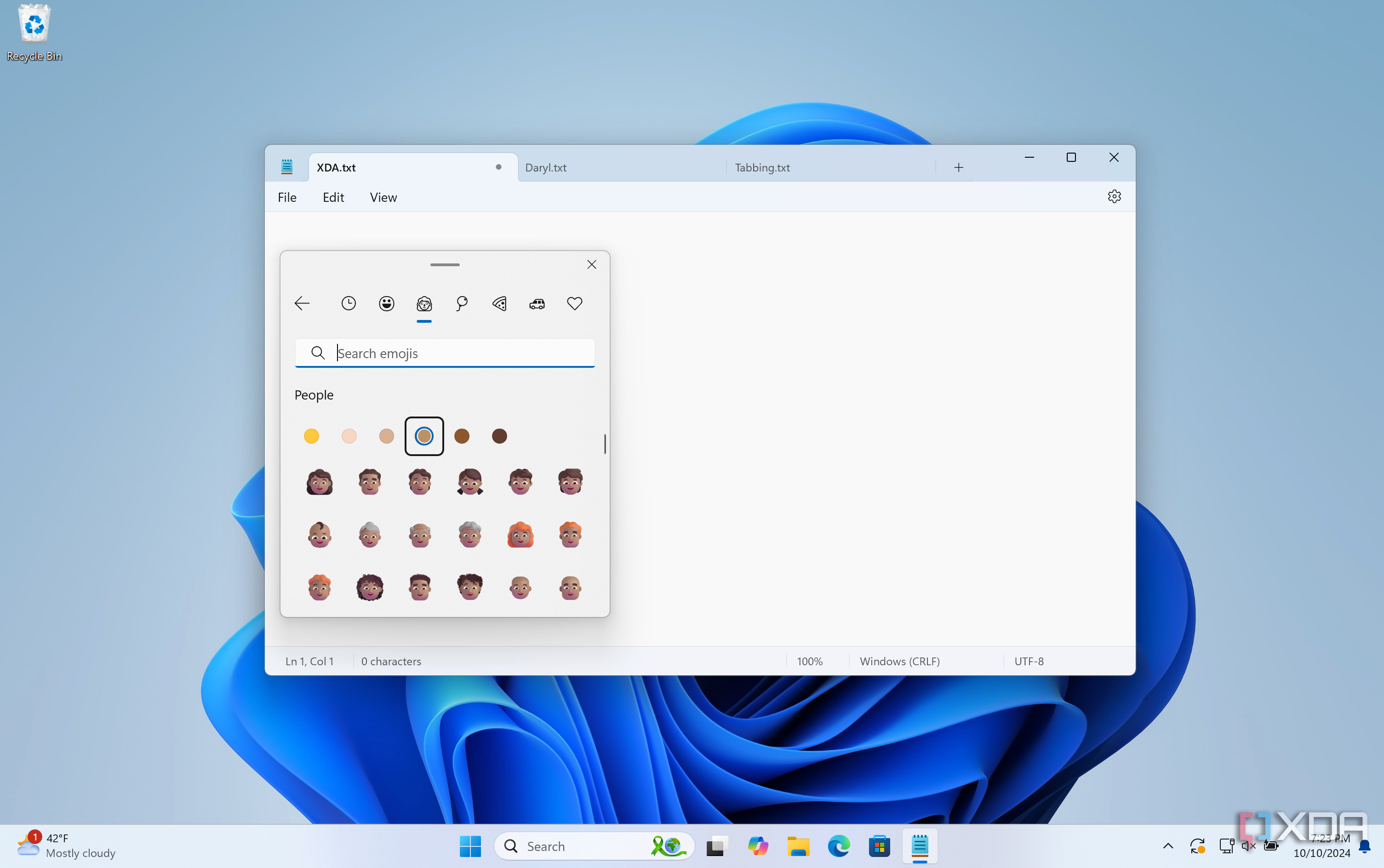 Using People Emojis in Windows Notepad