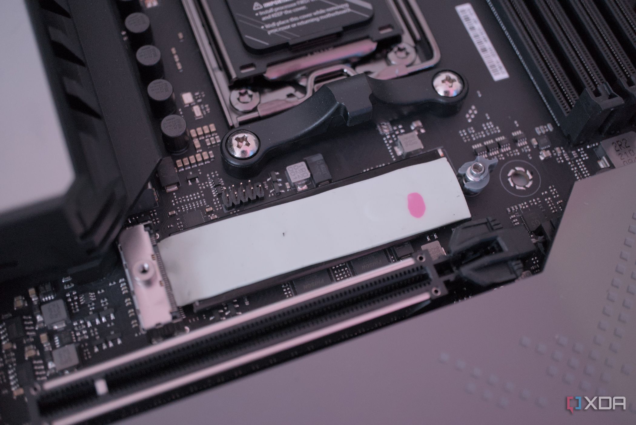 Thermal pad on the base of the primary M.2 slot on ASUS ROG Crosshair X670E Crosshair Hero motherboard