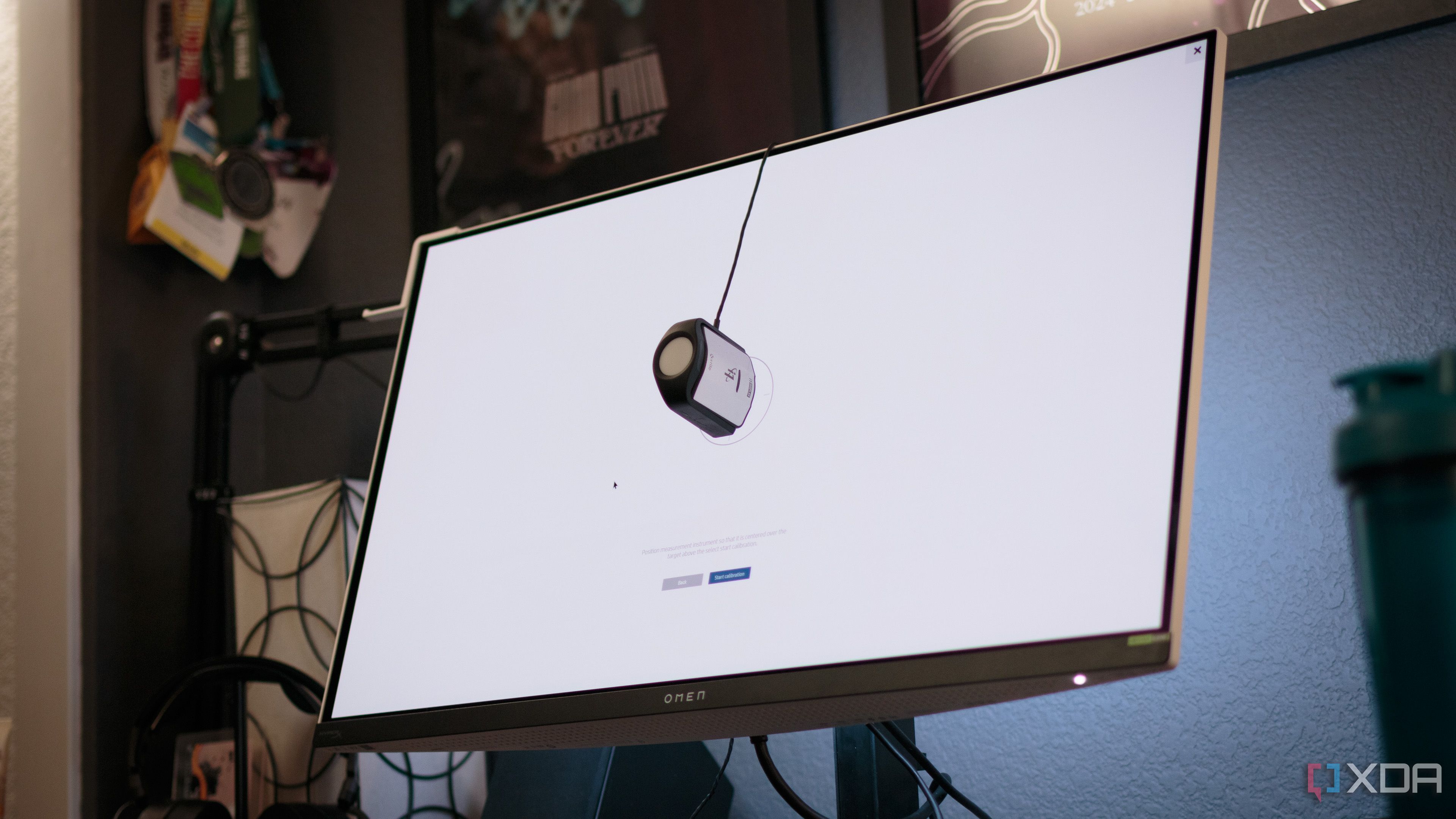 The calibration process on the HP OMEN Transcend 32 OLED using HP Display Center.