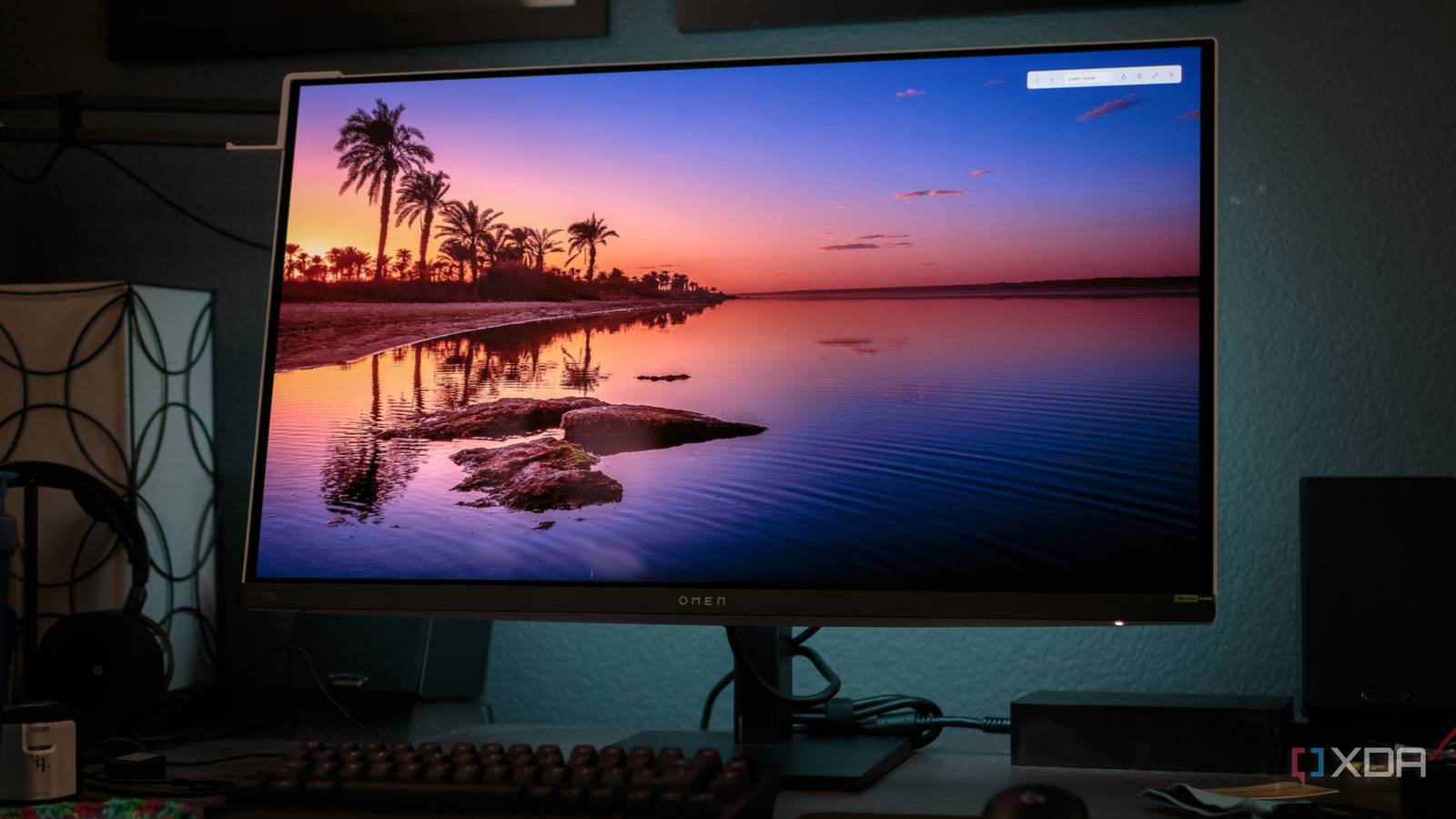The front of the HP OMEN Transcend 32 OLED showing a wallpaper.