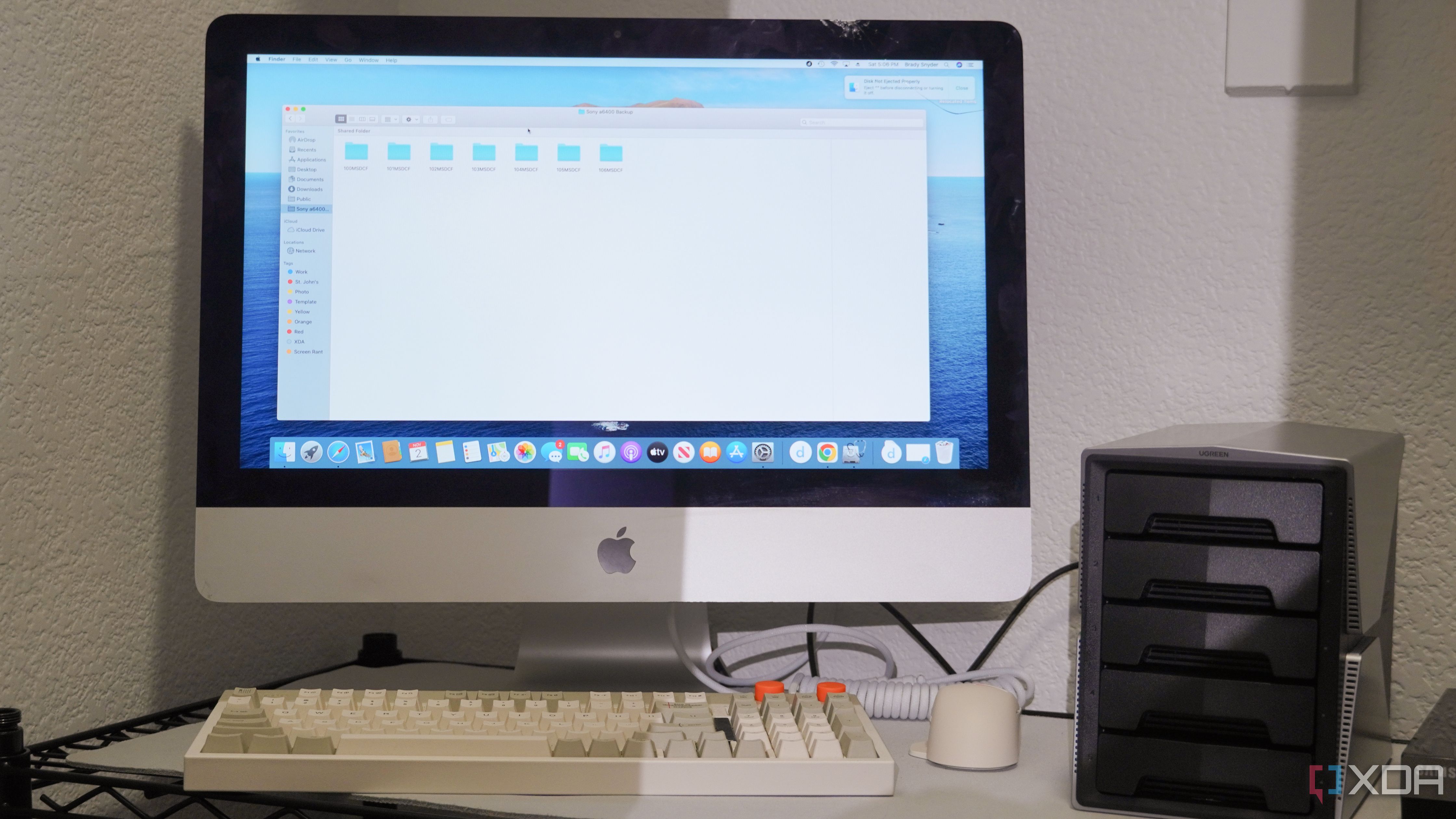 An iMac set up as a NAS in a closet.