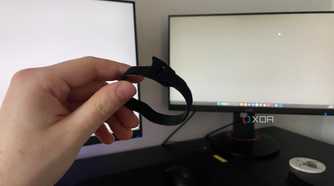 A photo of someone holding a cable tie