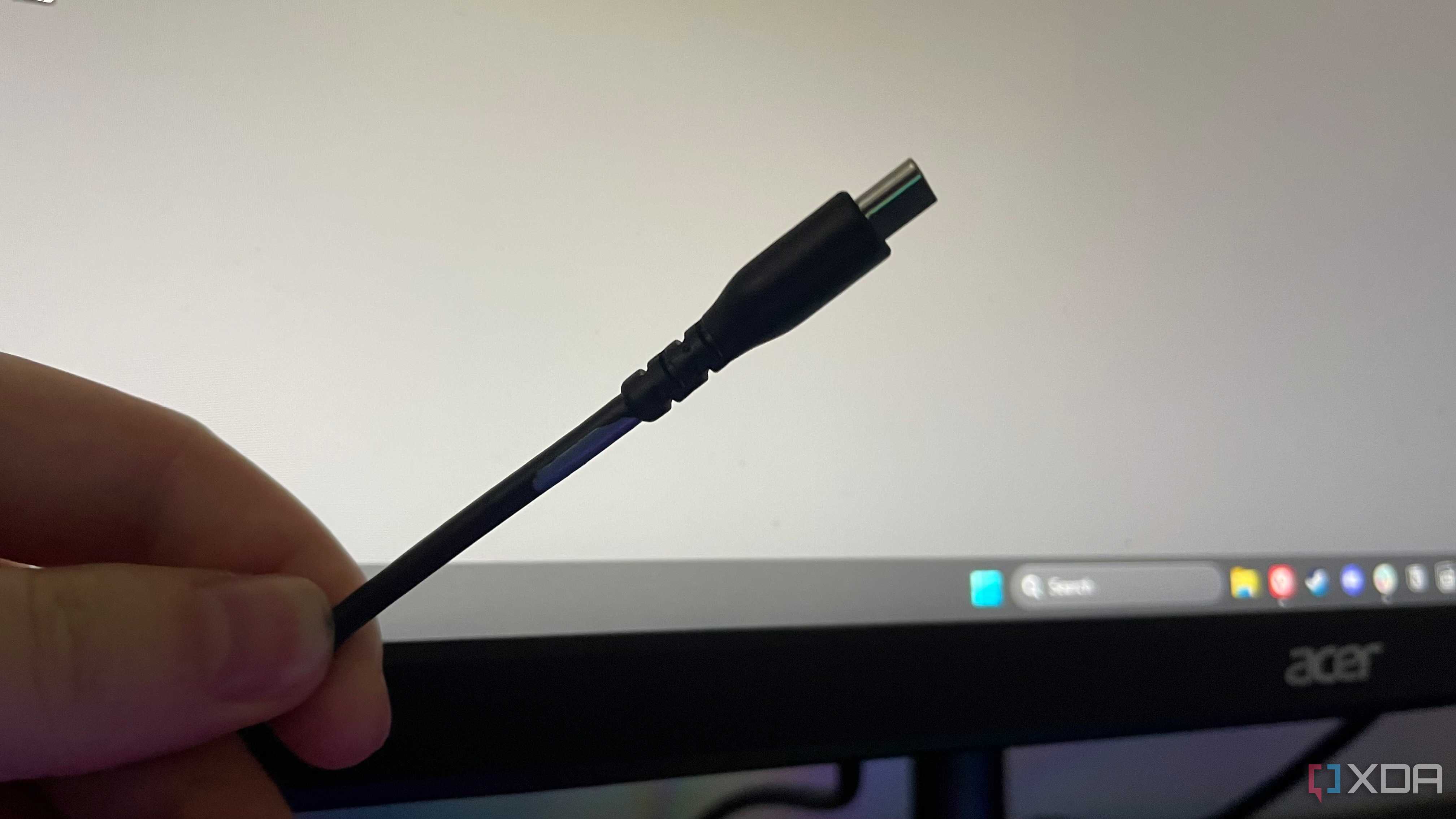 A USB-C cable marked with blue