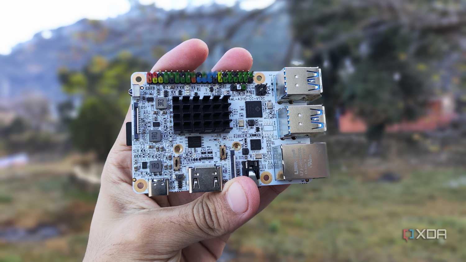 A person holding a Libre Computer Alta SBC