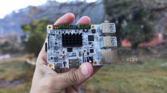 A person holding a Libre Computer Alta SBC