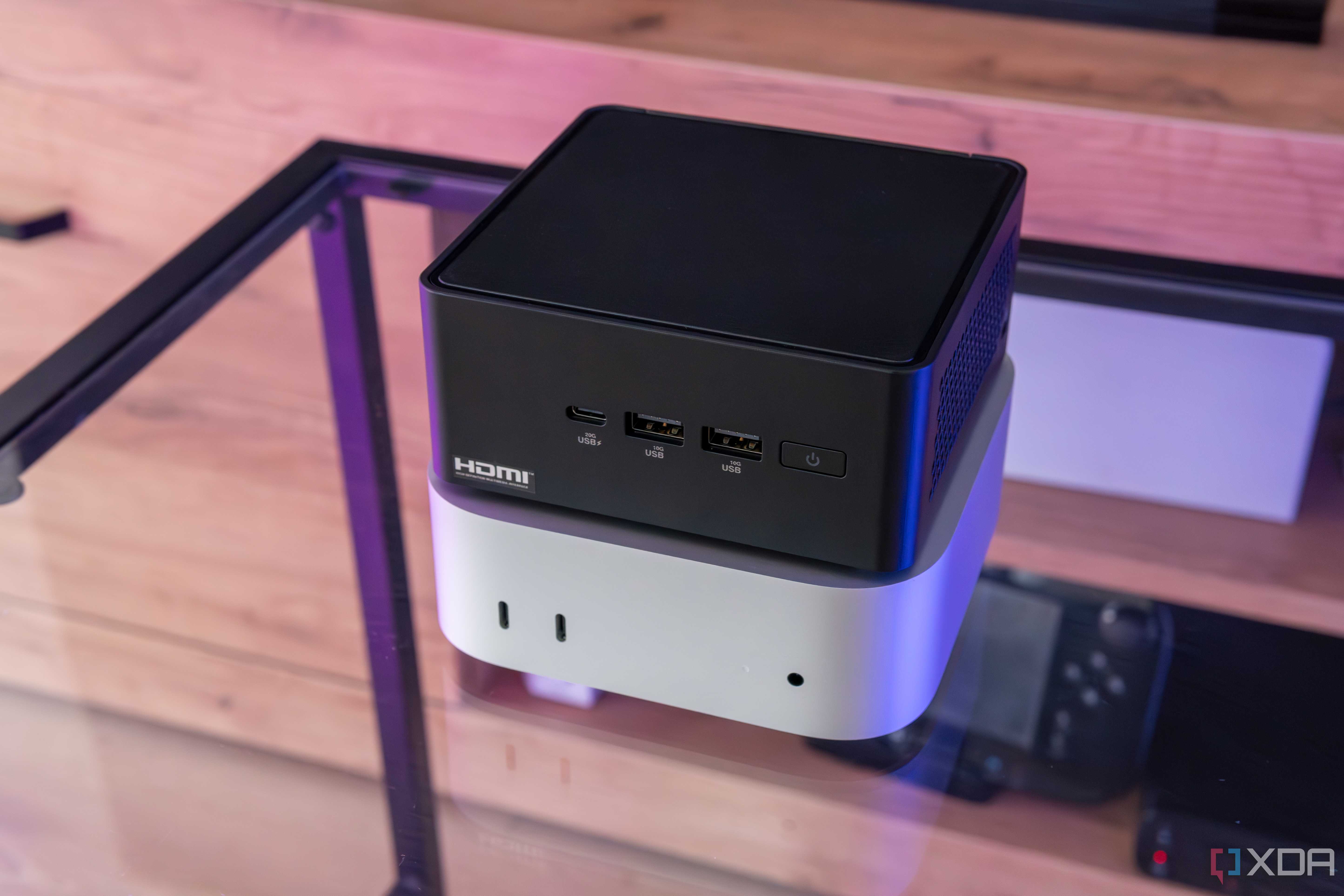 Angles view of the M4 Mac Mini with the Asus NUC 14 Pro stacked on top of it