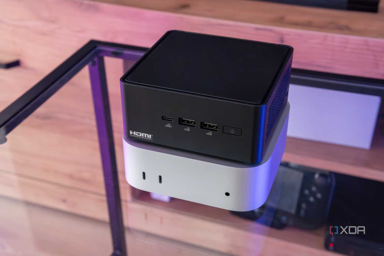 Angles view of the M4 Mac Mini with the Asus NUC 14 Pro stacked on top of it