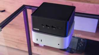 Angles view of the M4 Mac Mini with the Asus NUC 14 Pro stacked on top of it