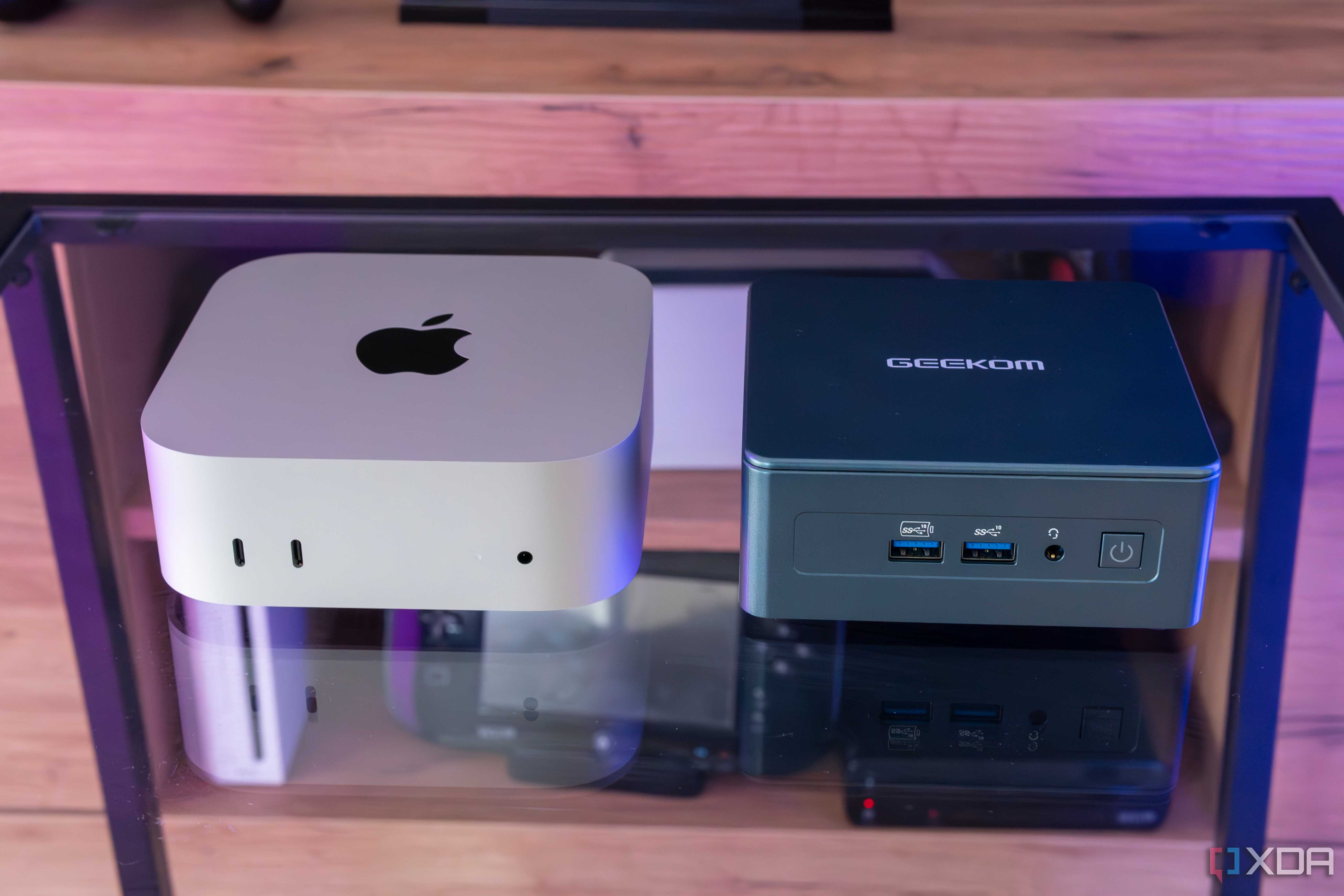 An M4 Mac Mini next to a Geekom Mini IT13