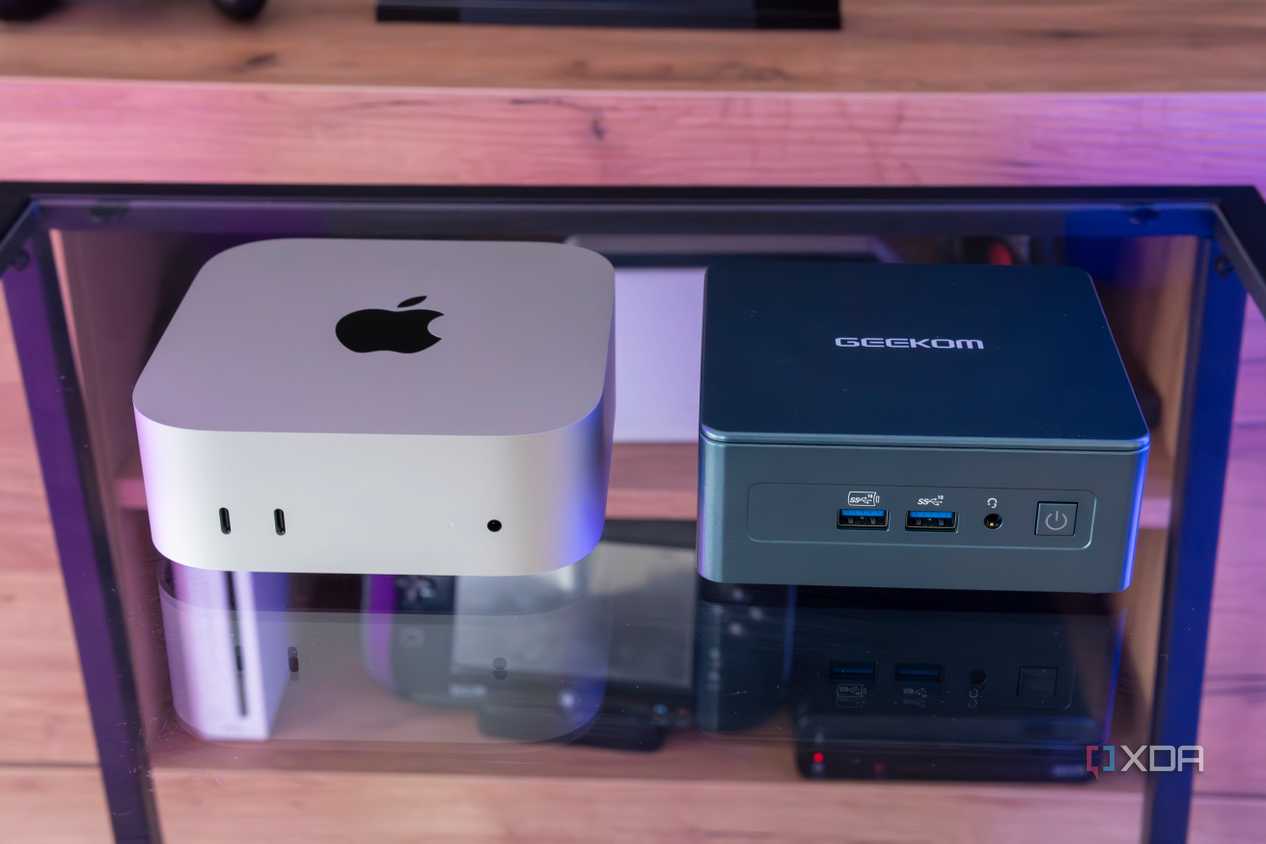 An M4 Mac Mini next to a Geekom Mini IT13