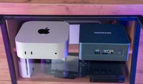 An M4 Mac Mini next to a Geekom Mini IT13