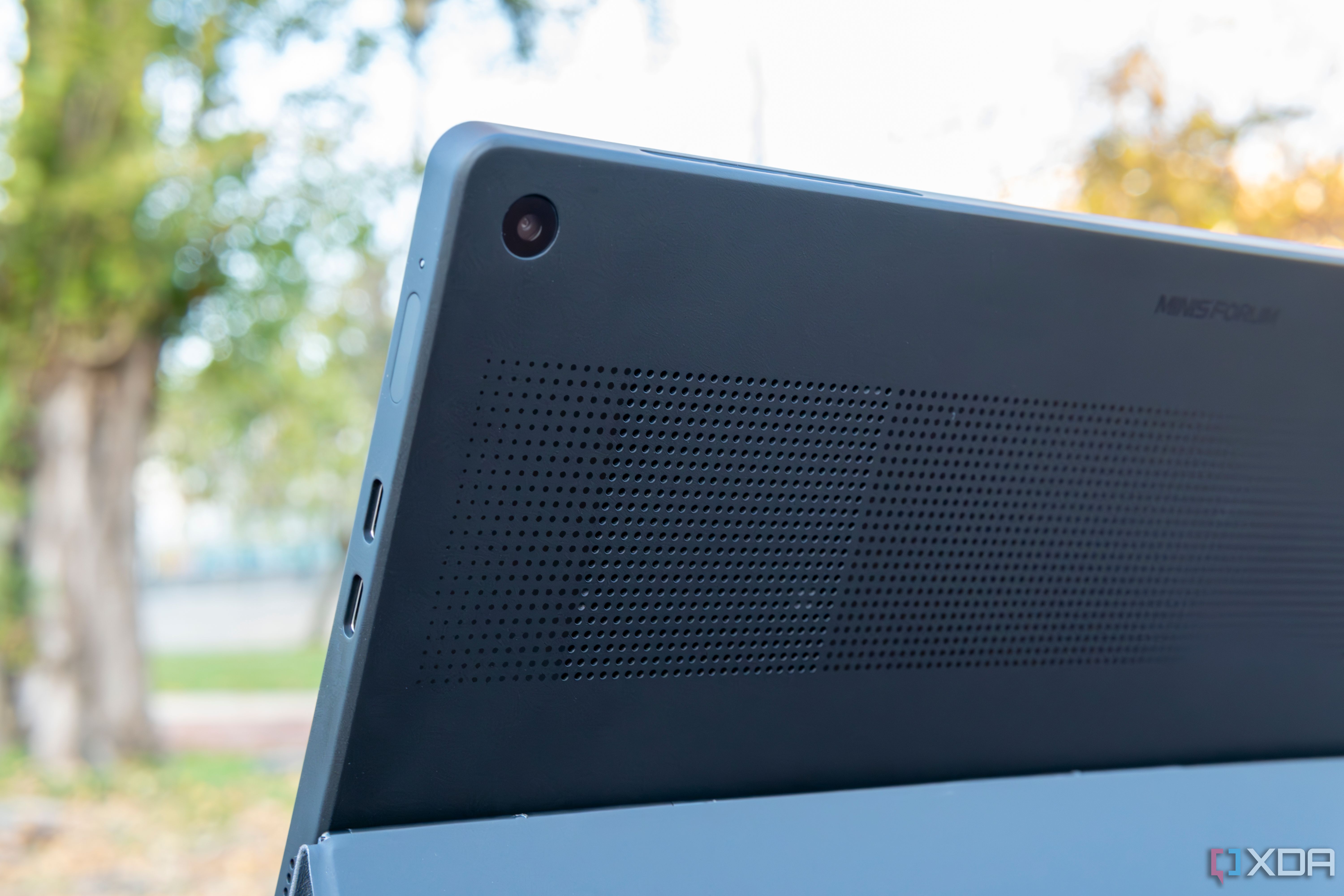 Close-up view of the rear camera on the Minisforum V3
