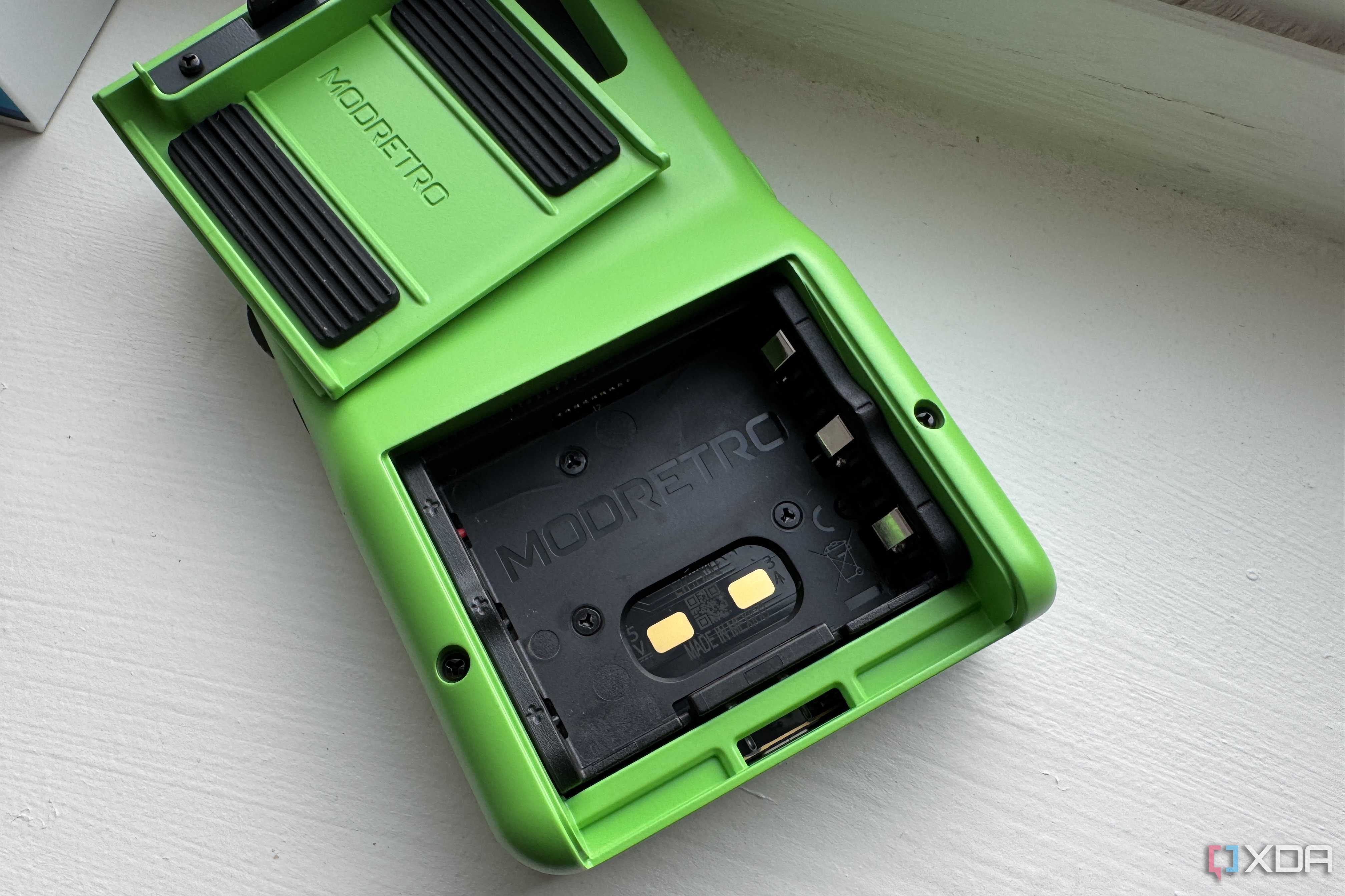 modretro chromatic in leaf color showing the battery connectors for the upcoming rechargeable battery pack