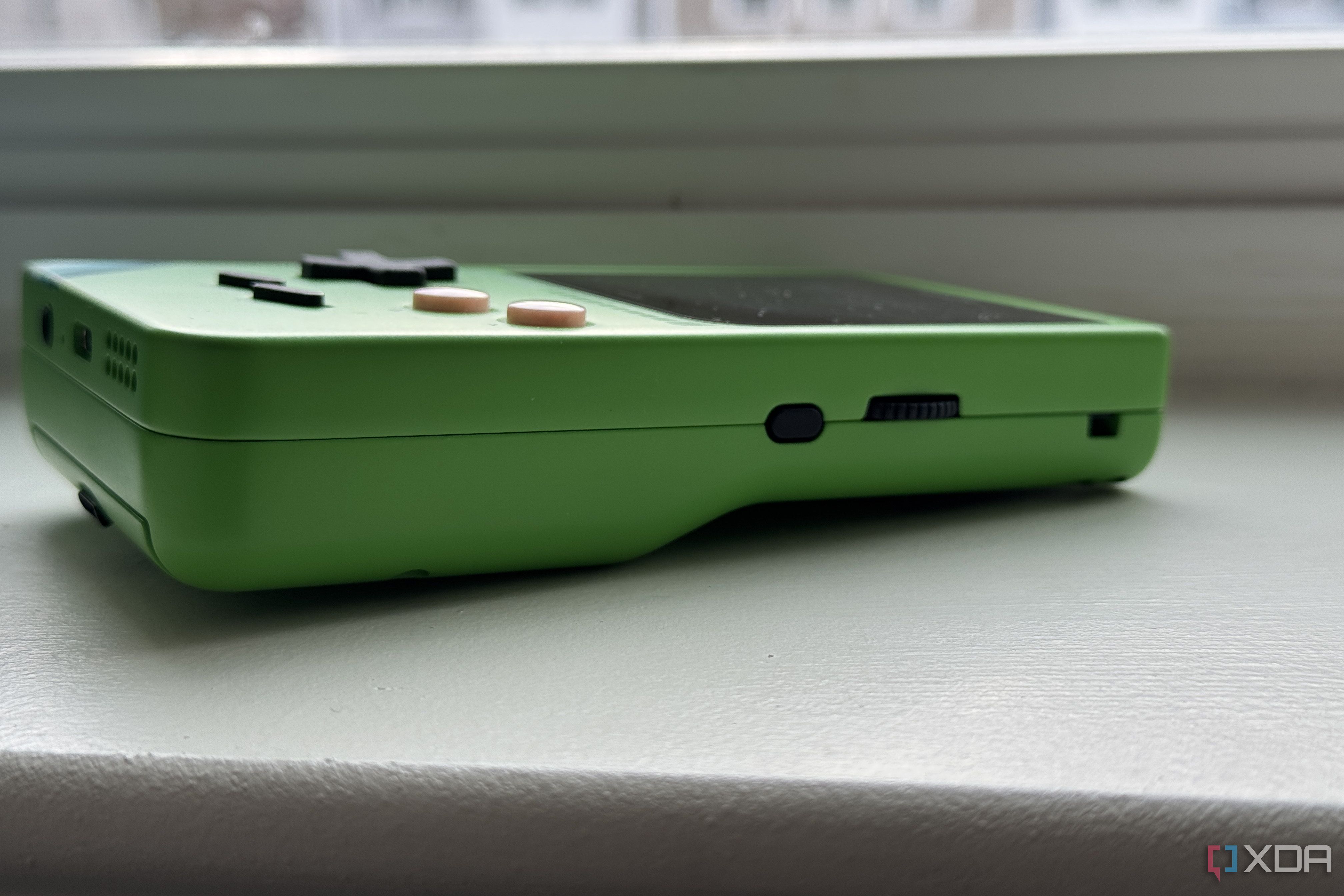 modretro chromatic in leaf color shown from the right showing the menu button and volume wheel
