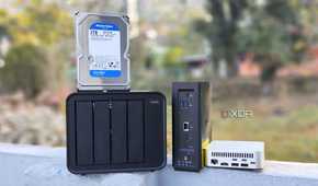 A TerraMaster F4-424 Max, F8 SSD Plus, and an Aiffro K100 placed side-by-side