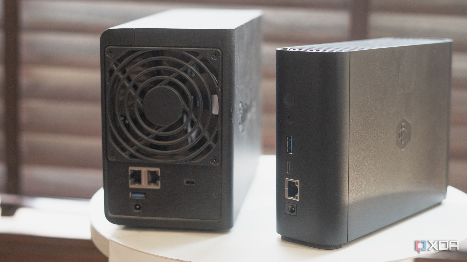 Synology Beestation vs NAS drive showing rear profile placed on table