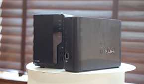 Synology Beestation vs NAS drive showing side profile placed on a table