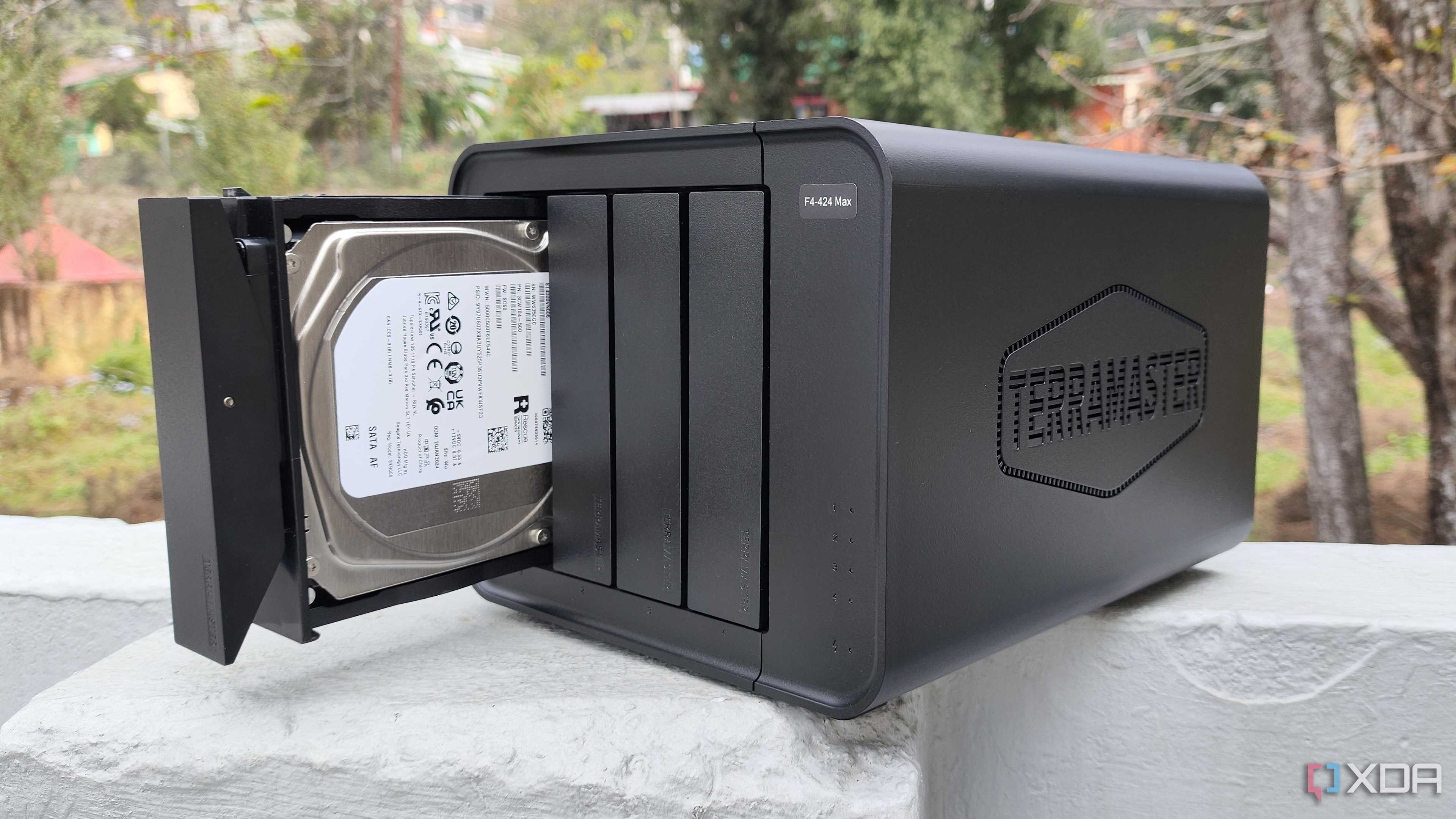 A person holding the TerraMaster F4-424 Max NAS