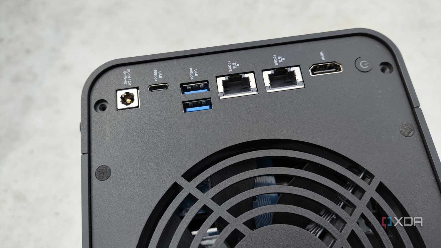 A person holding the TerraMaster F4-424 Max NAS