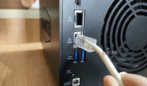 Plugging an Ethernet cable into the 10GbE LAN port on the TerraMaster F4-424 Max NAS
