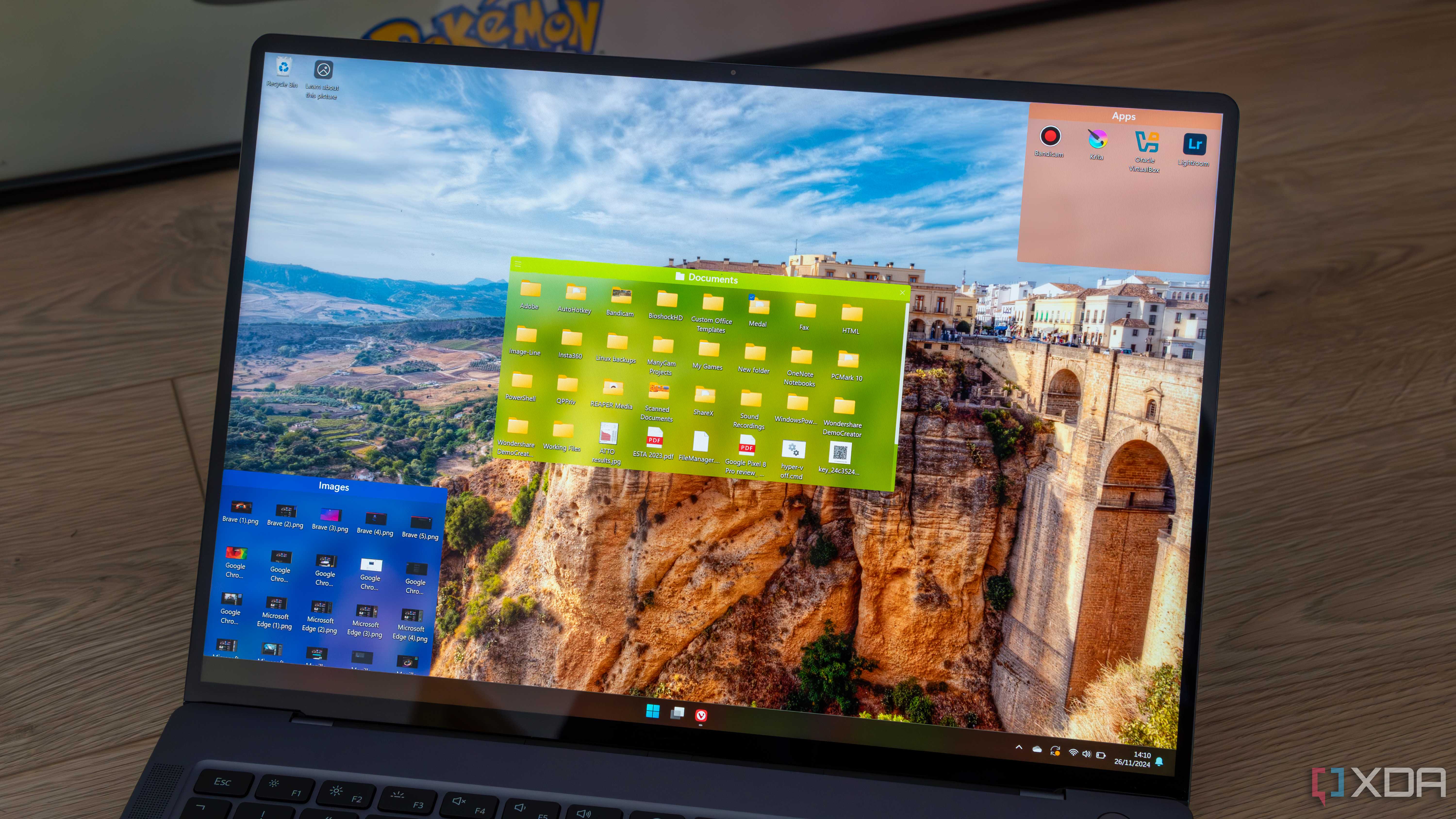 A Windows 11 laptop running Fences to organize the desktop icons