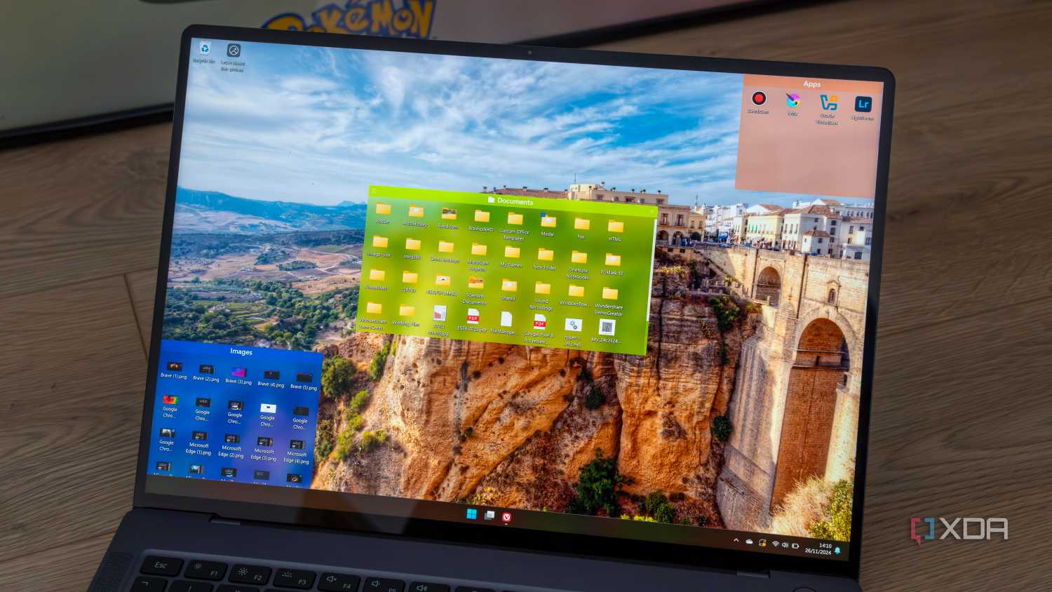 A Windows 11 laptop running Fences to organize the desktop icons