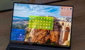 A Windows 11 laptop running Fences to organize the desktop icons