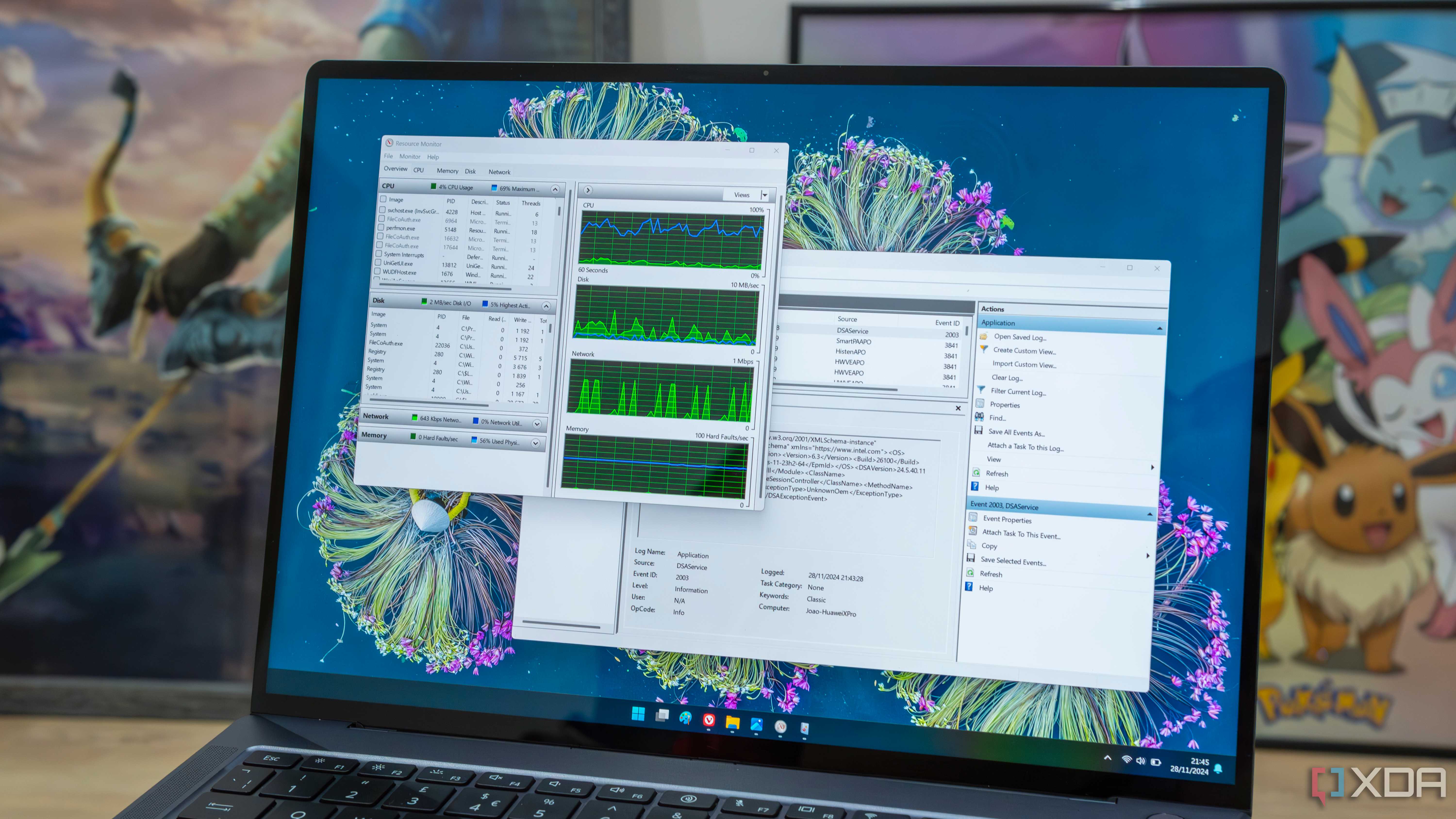 A Windows 11 laptop showing the Resource Monitor and Event Viewer tools