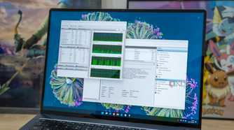 A Windows 11 laptop showing the Resource Monitor and Event Viewer tools