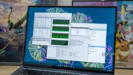 A Windows 11 laptop showing the Resource Monitor and Event Viewer tools