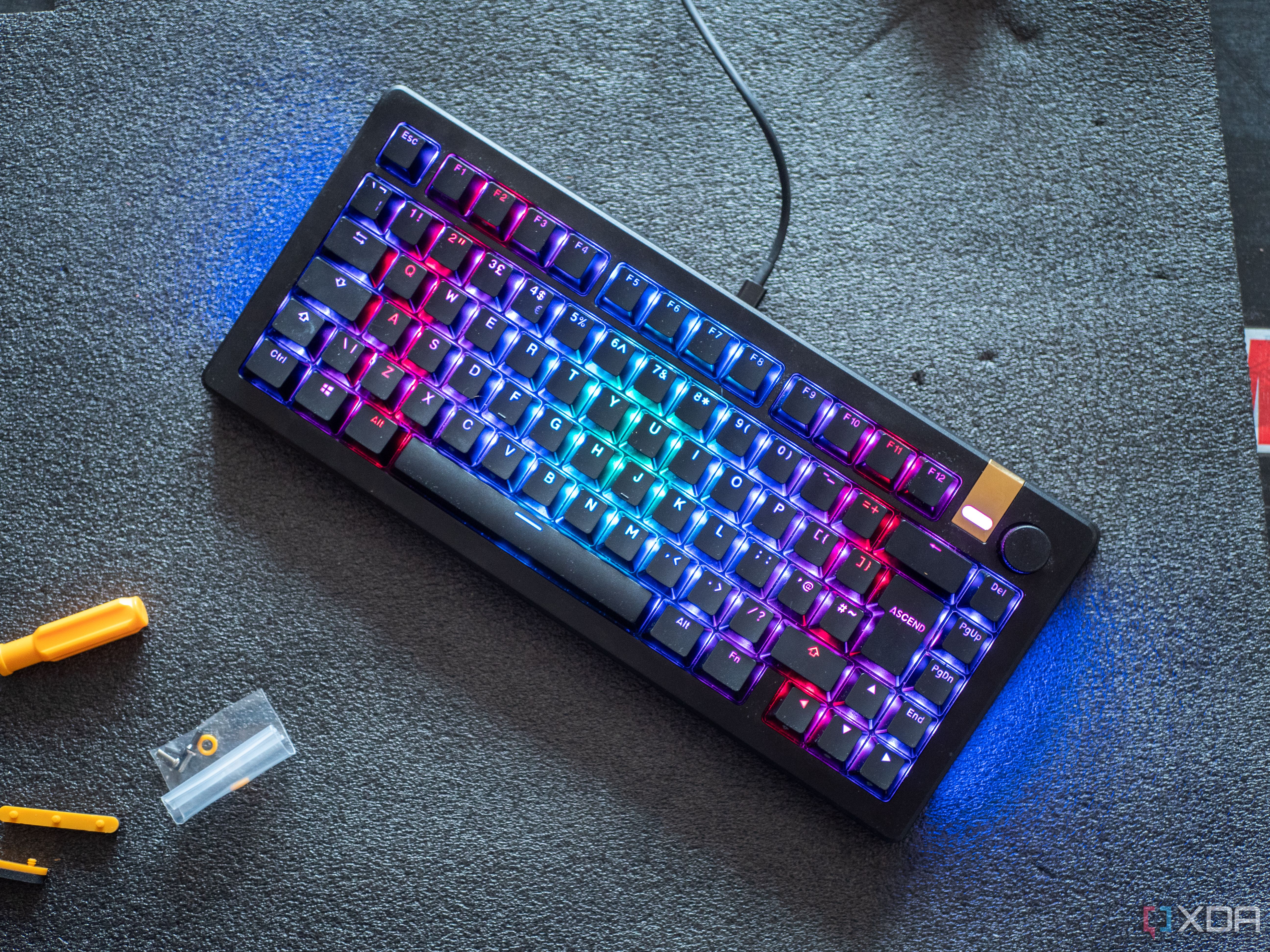 Glorious GMMK 3 Pro HE on a table with screwdrivers