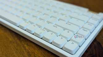 Close-up of a white low-profile mechanical keyboard
