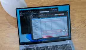 A Windows 11 laptop running OnlyOffice over a Microsoft Word window