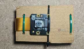 Raspberry Pi Camera Module 2 mounted on cardboard
