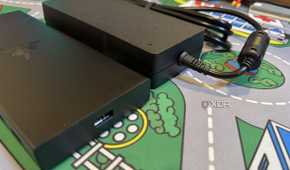 razer usb 4 dock next to its power brick