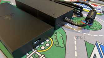razer usb 4 dock next to its power brick