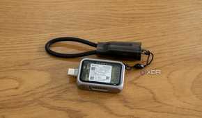 The Satechi Mini NVMe SSD Enclosure with the included USB-C cable lanyard