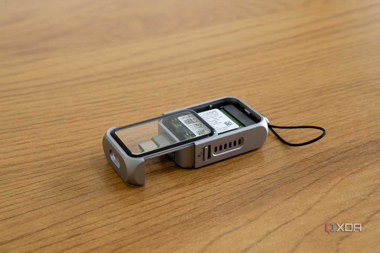 Angled view of the Satechi Mini NVMe SSD Enclosure with the SSD cover partly slid out